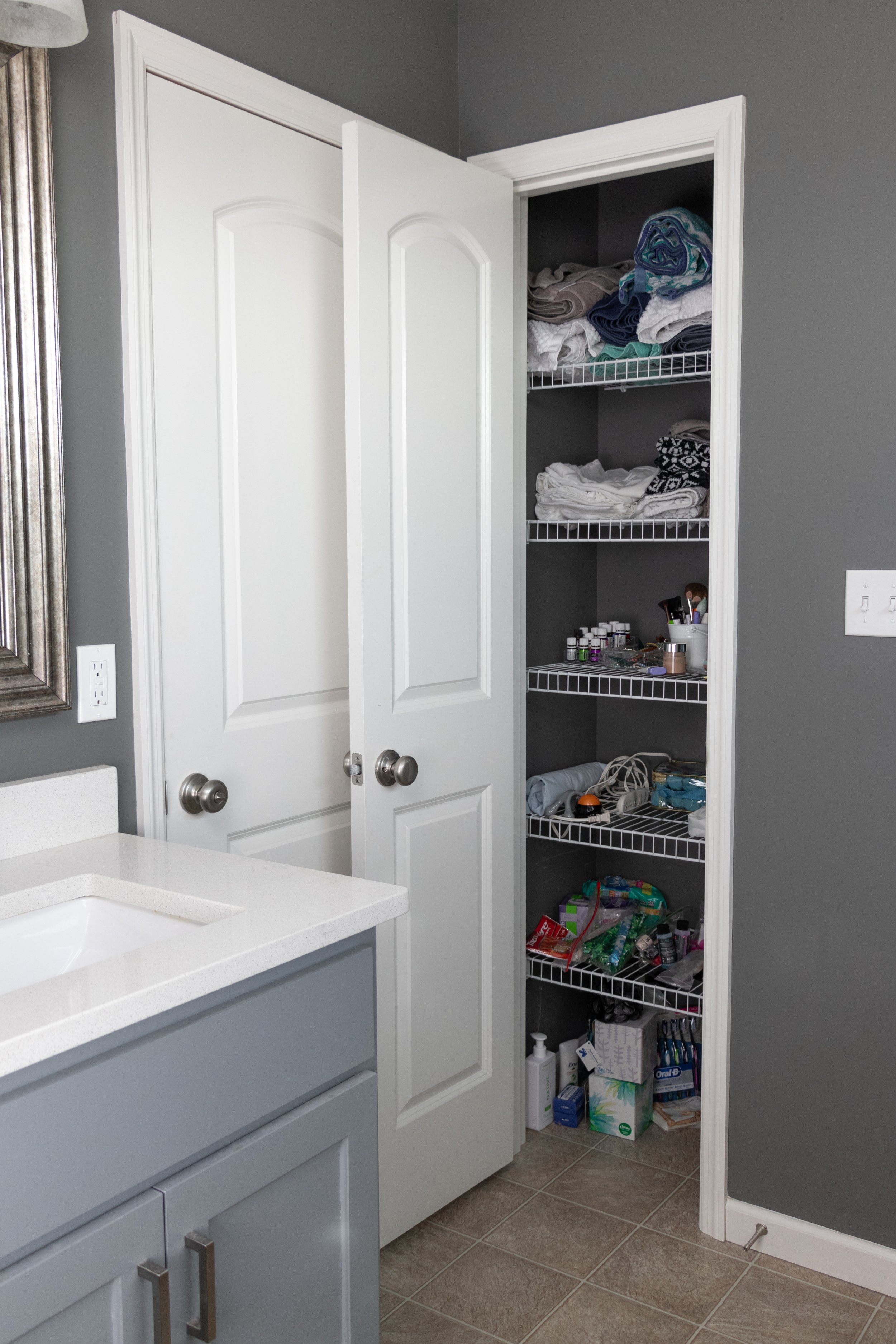 Organize the Bathroom Linen Closet Using 5 Target Baskets Home with Marika